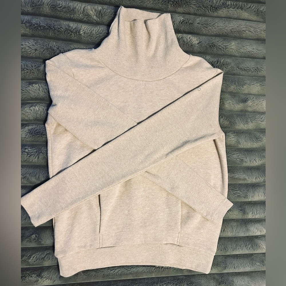 Alo turtleneck is perfect for before and after workouts or pairing with jeans.